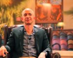 Jeff Bezos sitting in a Burgundy Leather Chair