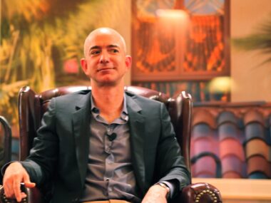 Jeff Bezos sitting in a Burgundy Leather Chair